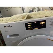 sua-may-say-quan-ao-miele-1