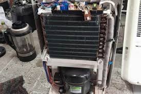 sua-may-hut-am-tai-nguyen-van-huyen